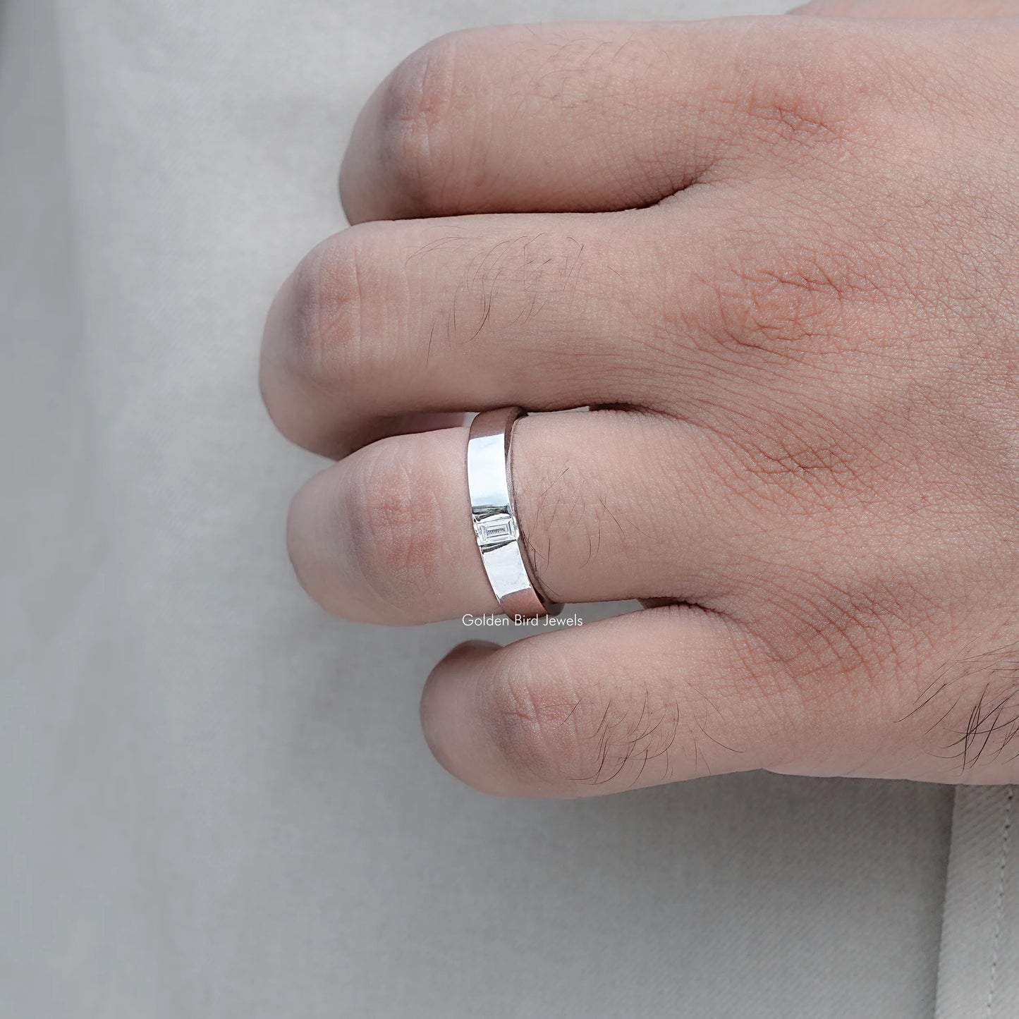 View of Baguette Cut Moissanite Solitaire Ring in prongs setting