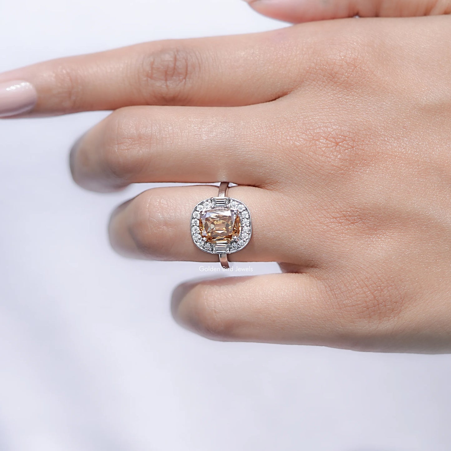 View of Cushion Moissanite Halo Engagement Ring in prongs setting