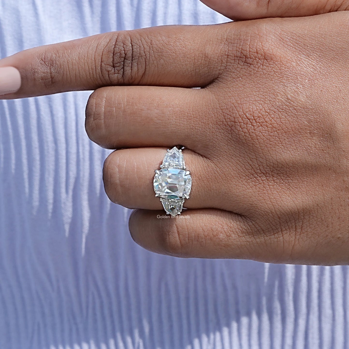 Close view of moissanite ring in secure setting