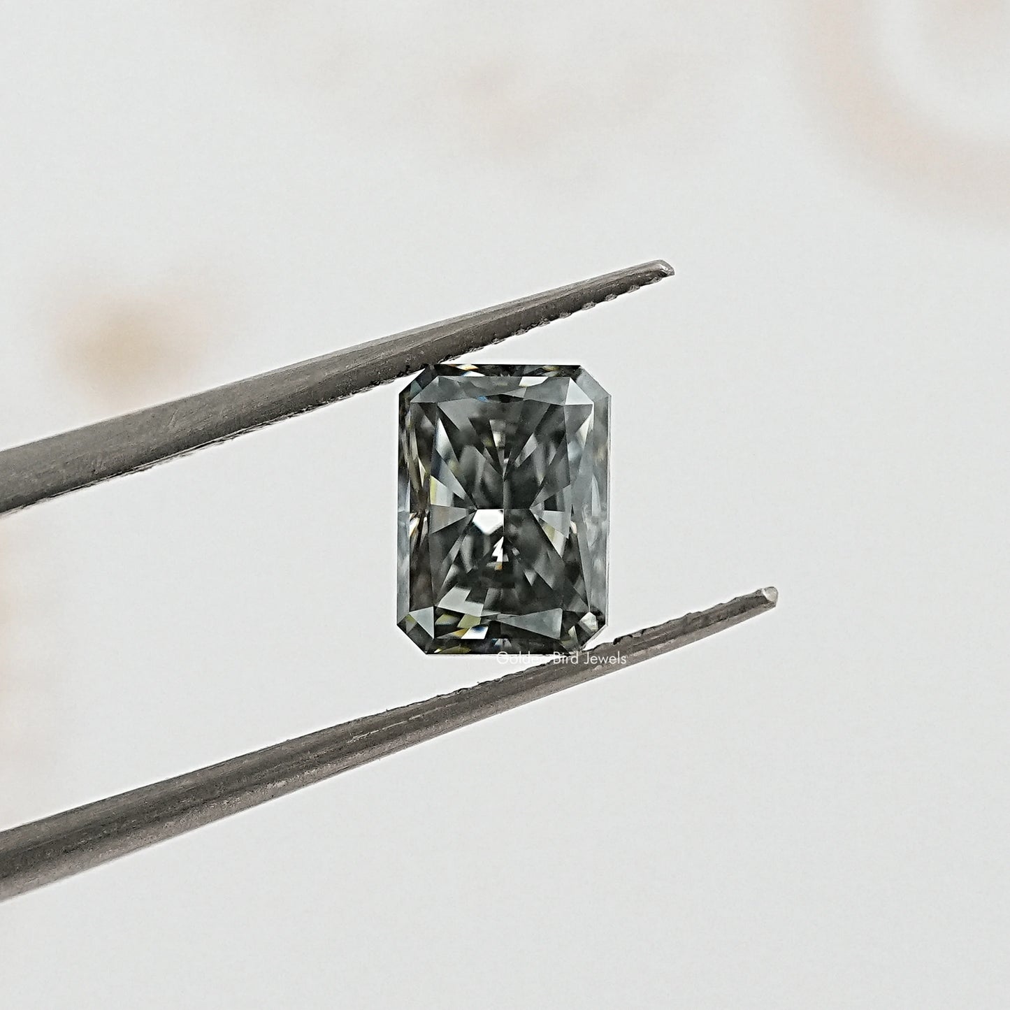 tweezers View of Radiant Shape Moissanite stone