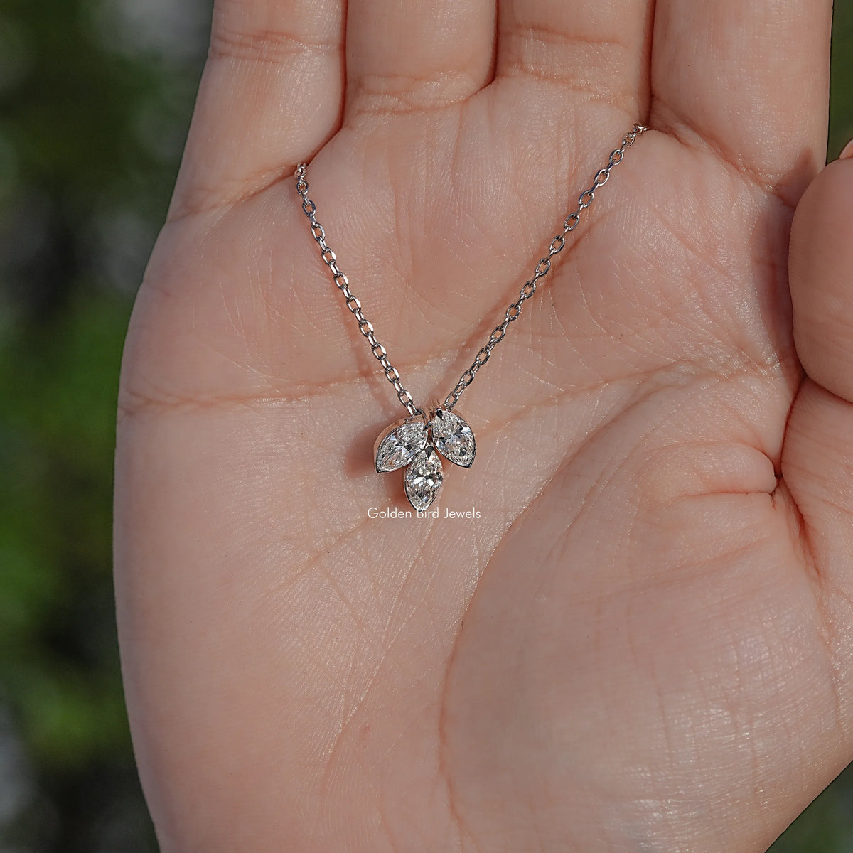 hand Showing View of Marquise Cut Lab Diamond Pendant