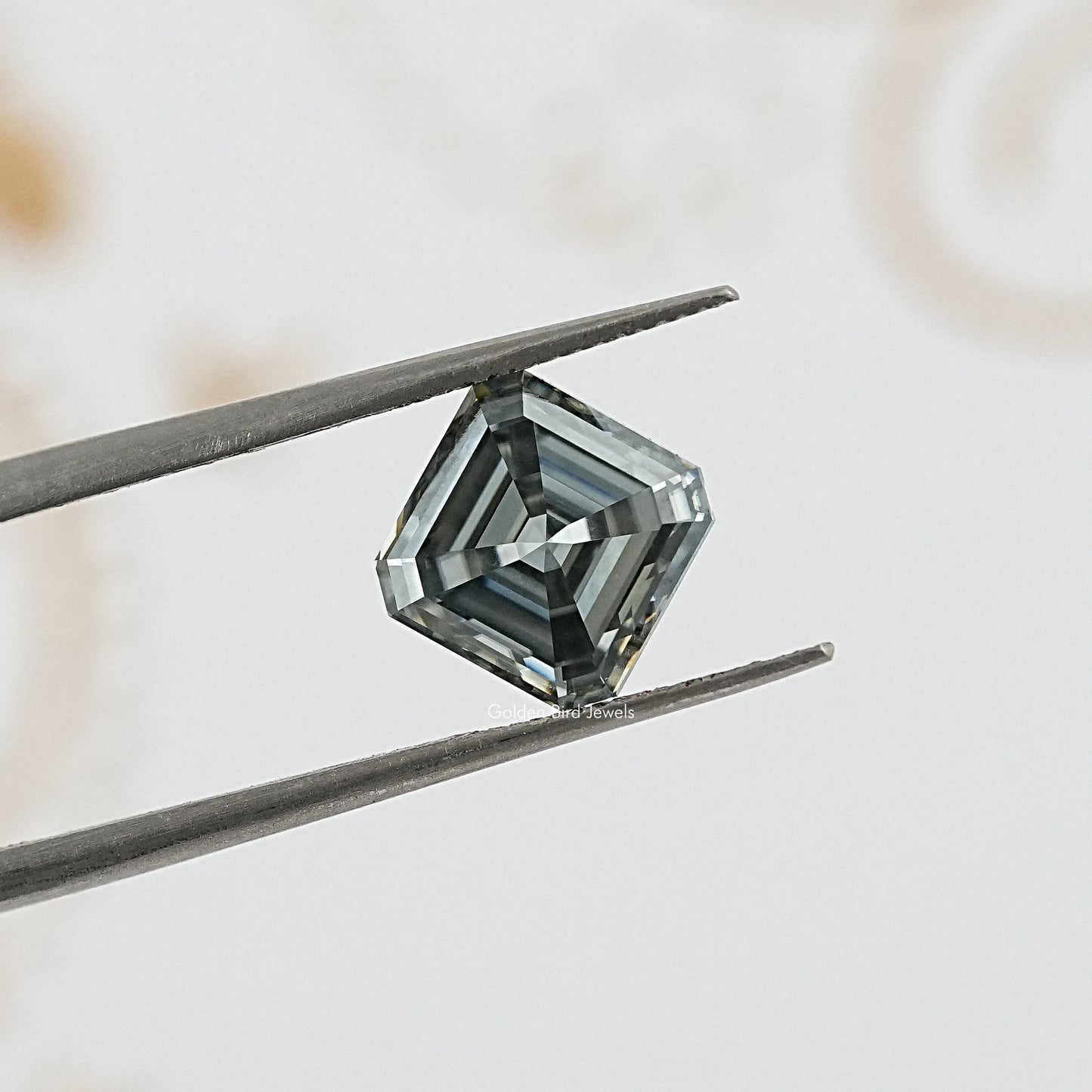 tweezers View of Gray Asscher Cut Moissanite