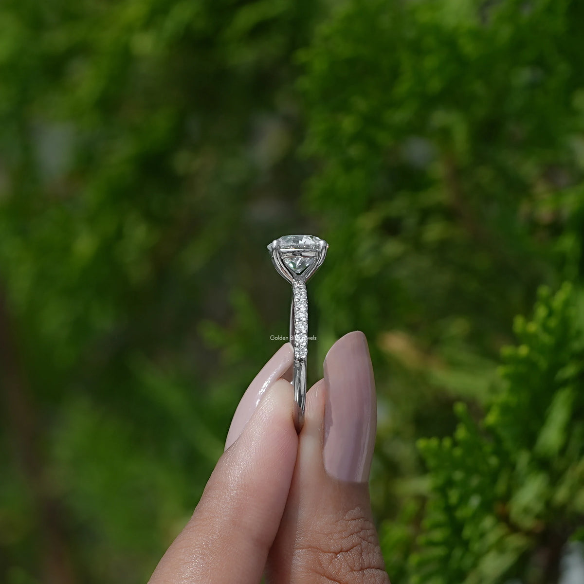 Side View of Old European Round Diamond Ring on two fingers
