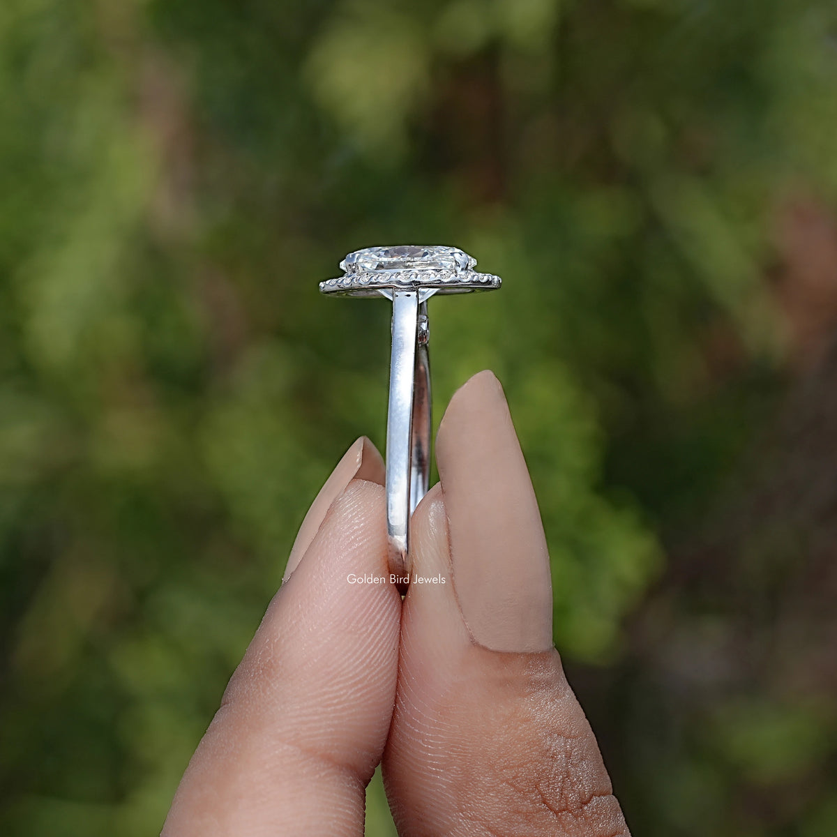 Side View Of Oval Lab Diamond Halo Engagement Ring