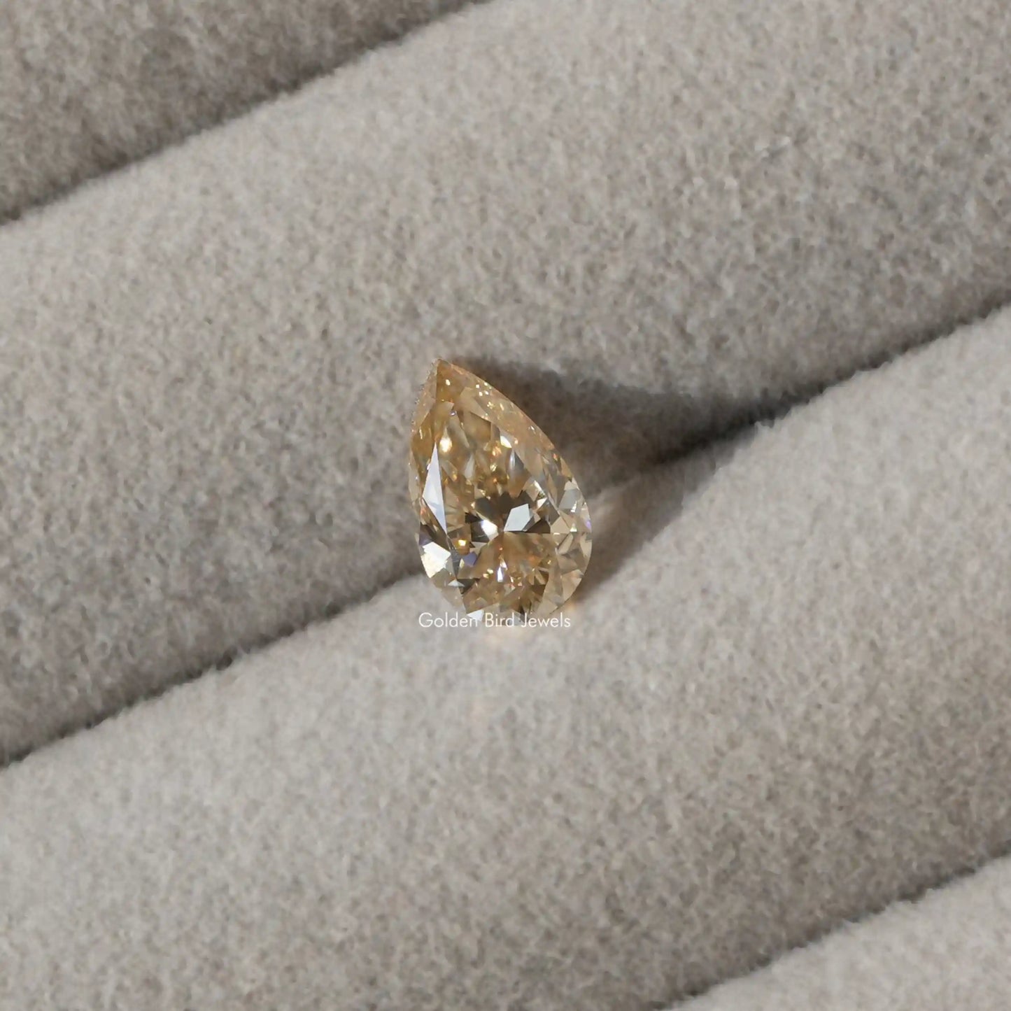 View of Champagne Old Mine Pear Shaped Diamond
