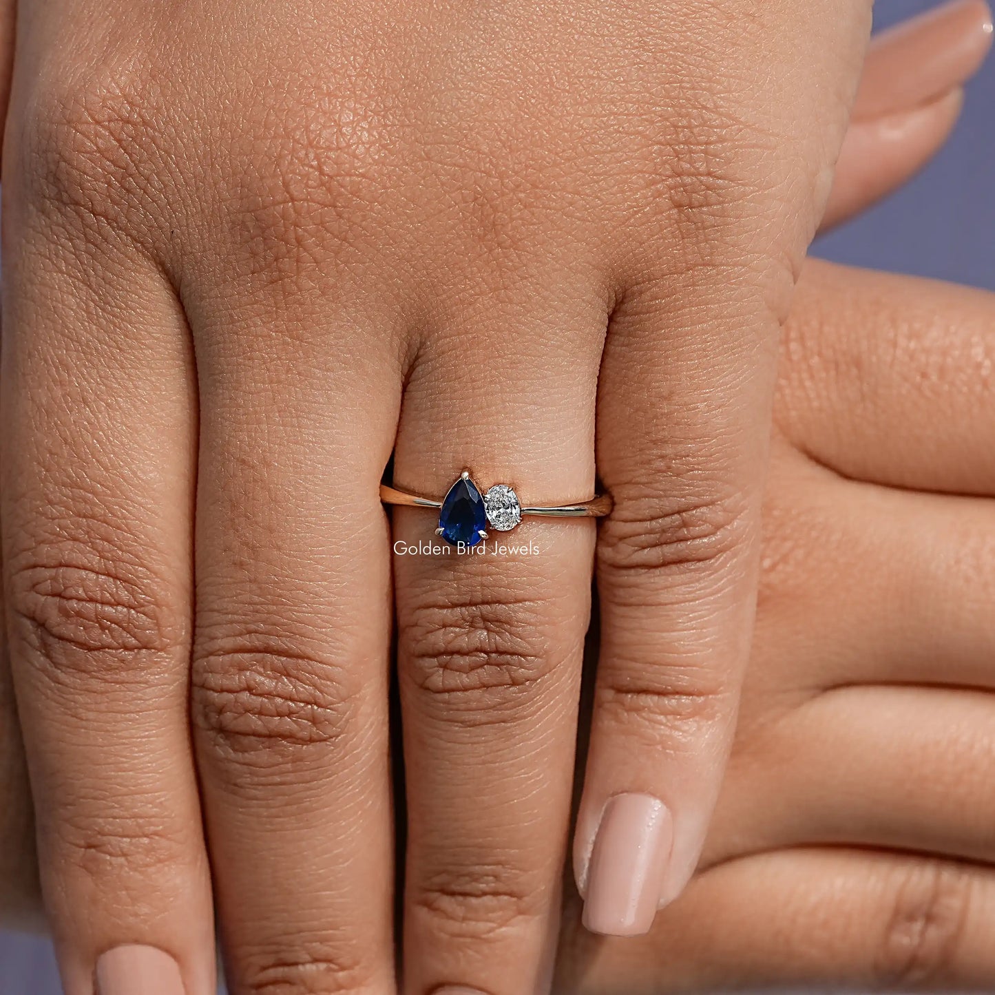 Detailed View Of Pear Cut Blue Gemstone Toi Et Moi Ring