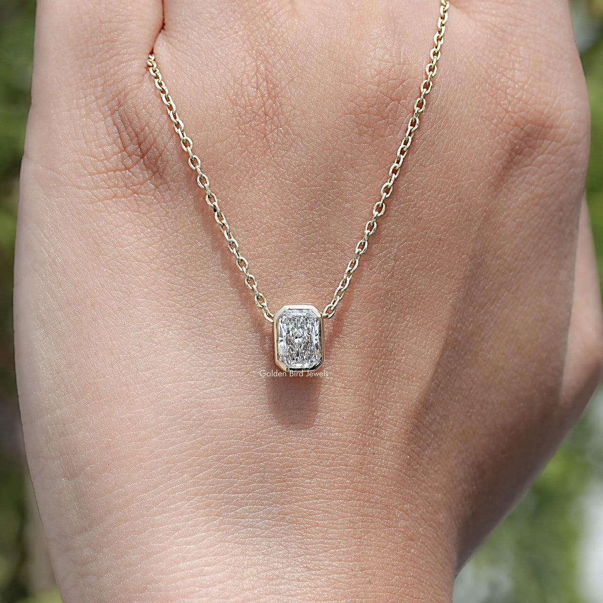 hand Showing View of Radiant Cut Lab Diamond Pendant
