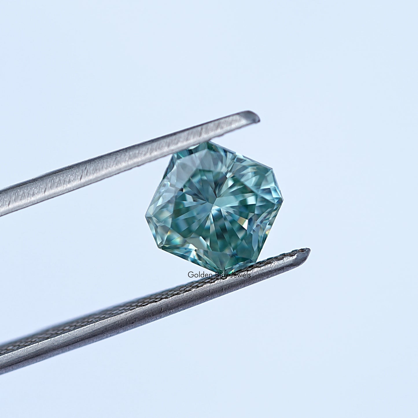 Tweezer view of Moissanite Radiant Cut Loose Stone