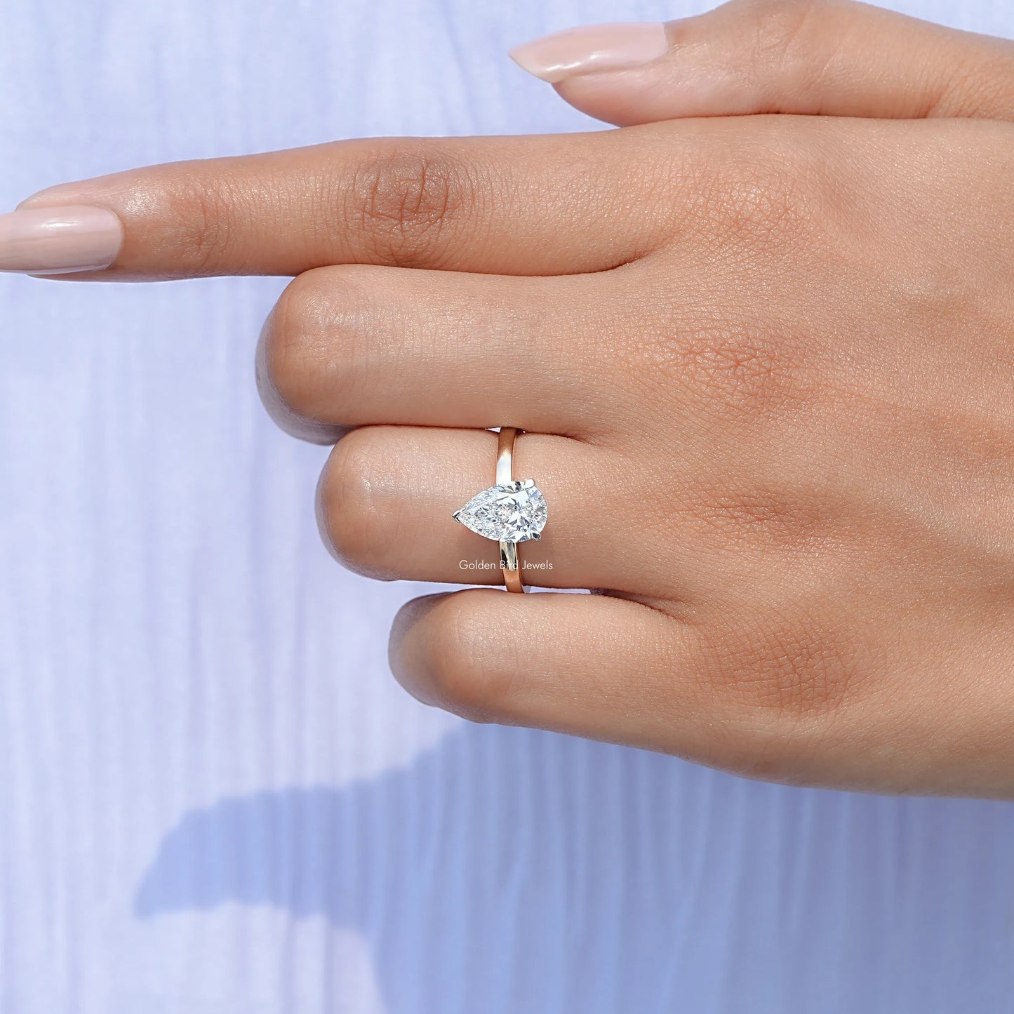View of Pear Cut Lab Diamond Solitaire Ring In Finger