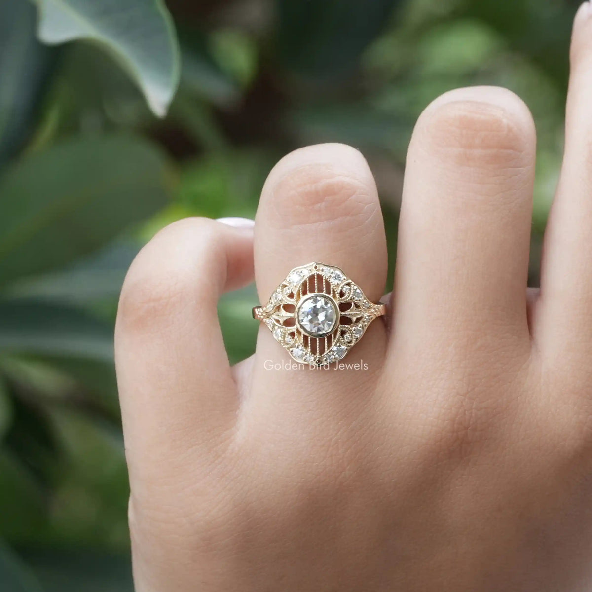 View of Bezel Set Round Cut Moissanite Vintage Ring In Finger