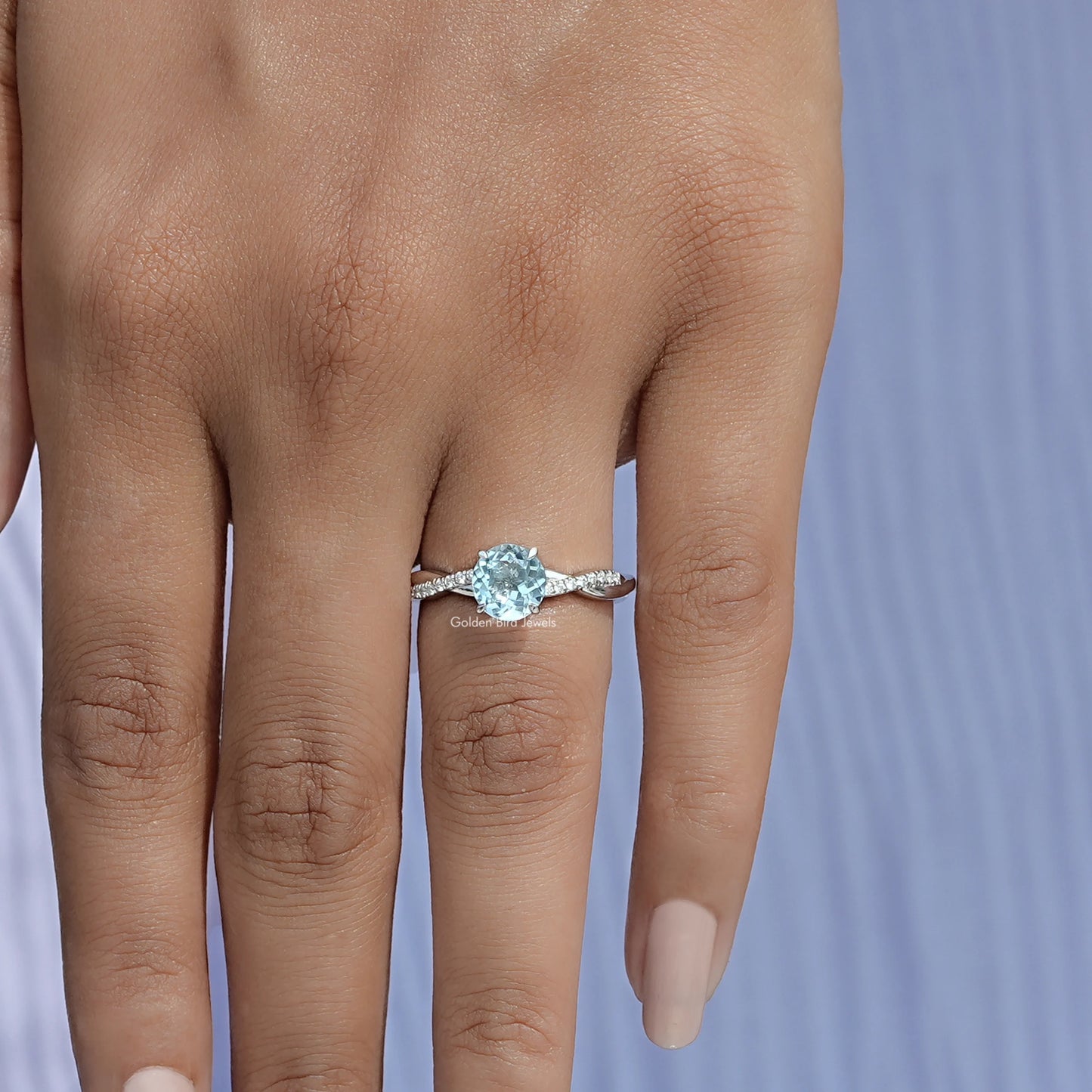 Close-Up View of Blue Aquamarine Round Cut Gemstone Ring In White Gold 