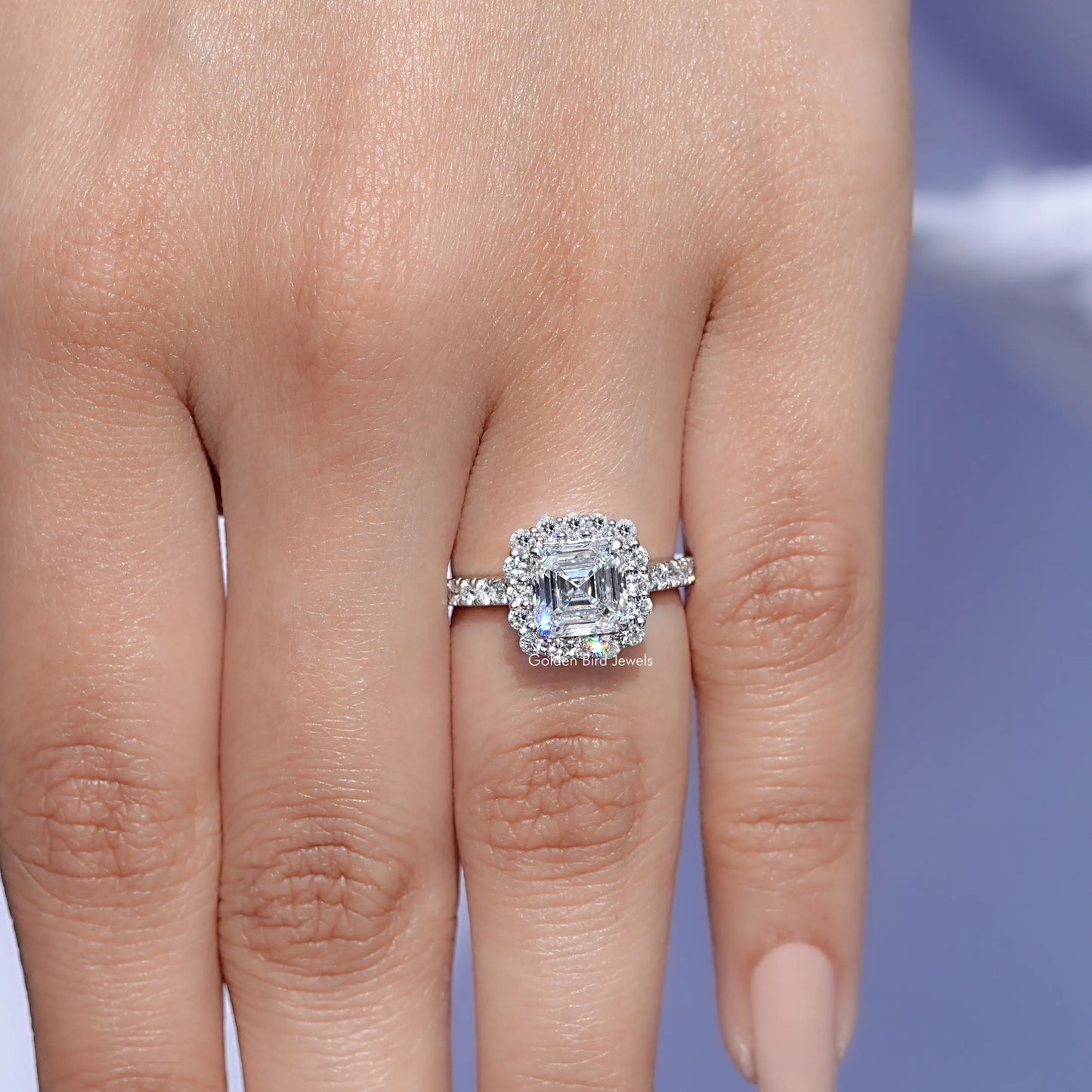 In finger front view of Asscher Moissanite Engagement Ring in unique shape