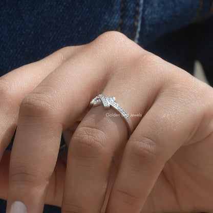 View of Ribbon Style Round Cut Moissanite Ring In Finger