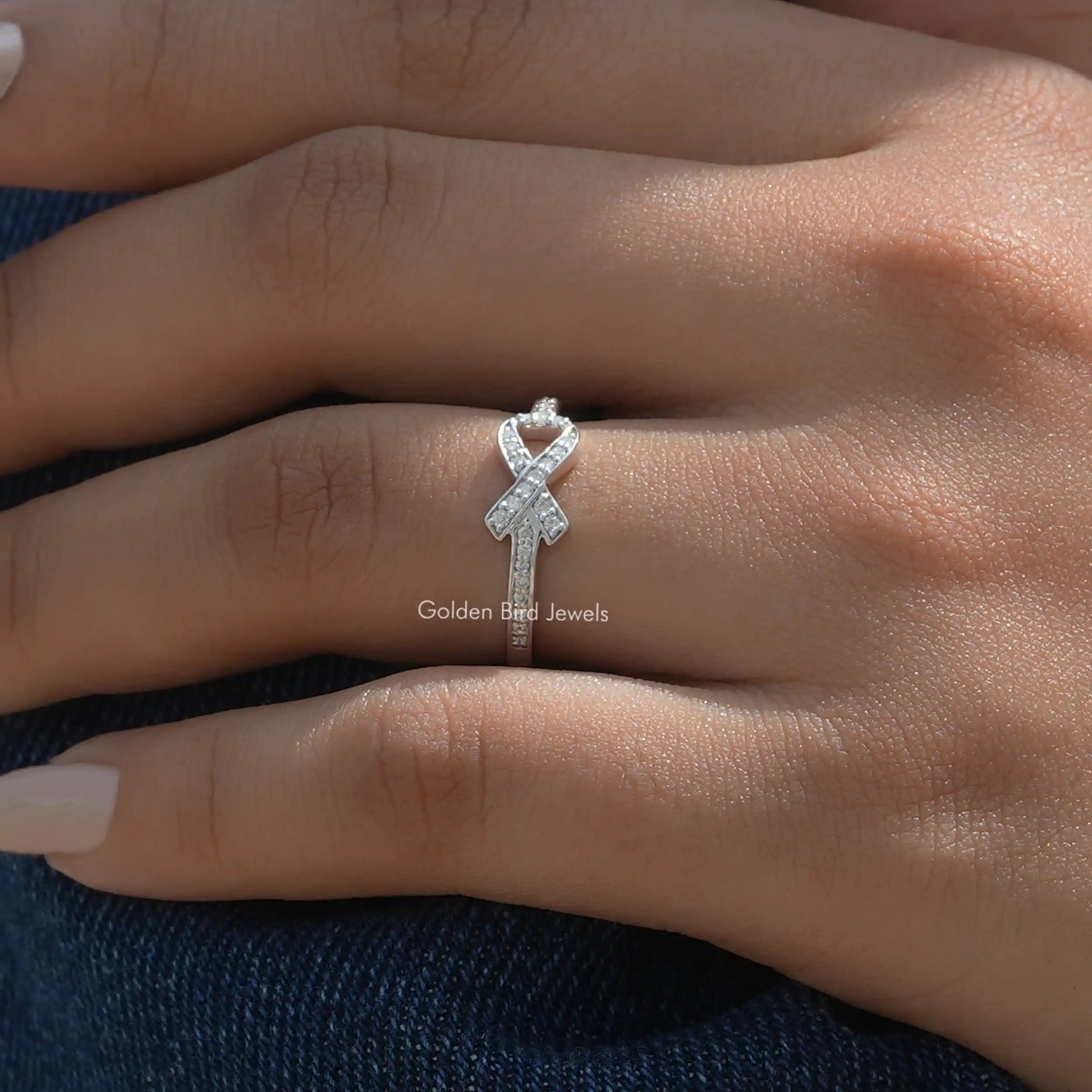 Ribbon Style Round Cut Moissanite Ring In Finger