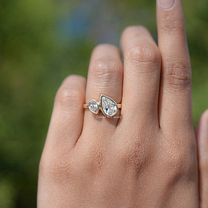 In finger front view of Lab Diamond Toi Et Moi Ring  
