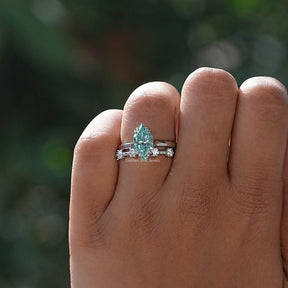 Close-Up View of Dutch Marquise And Round Cut Moissanite Ring Set In White Gold