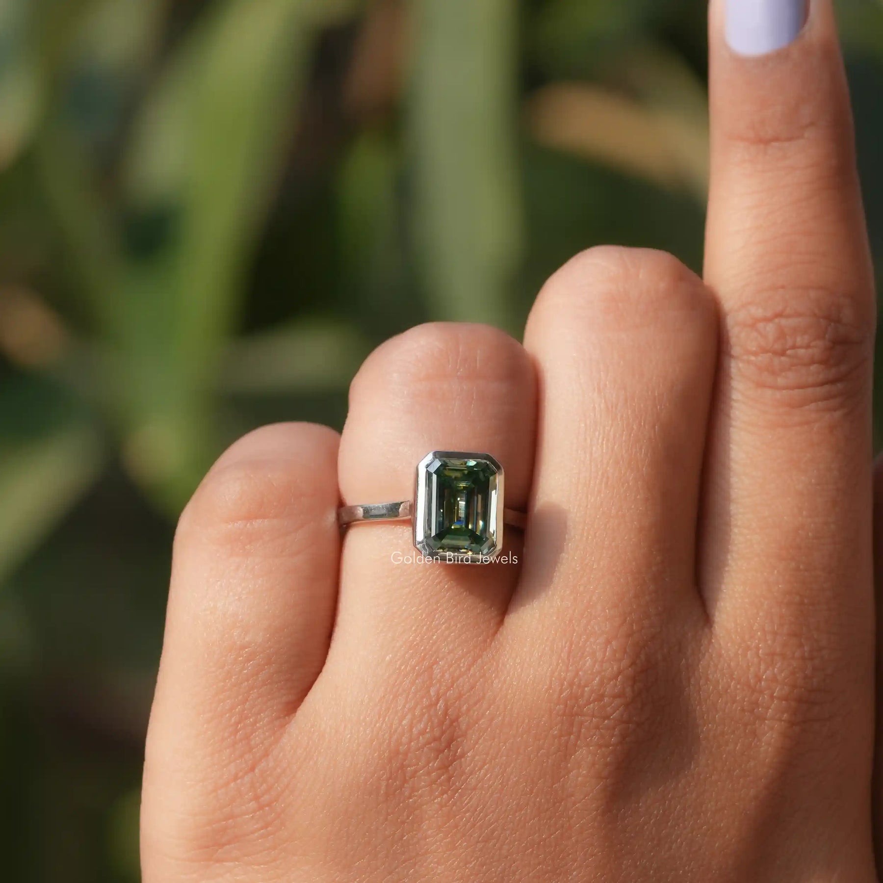 Emerald Cut Bezel Set Moissanite Solitaire Ring