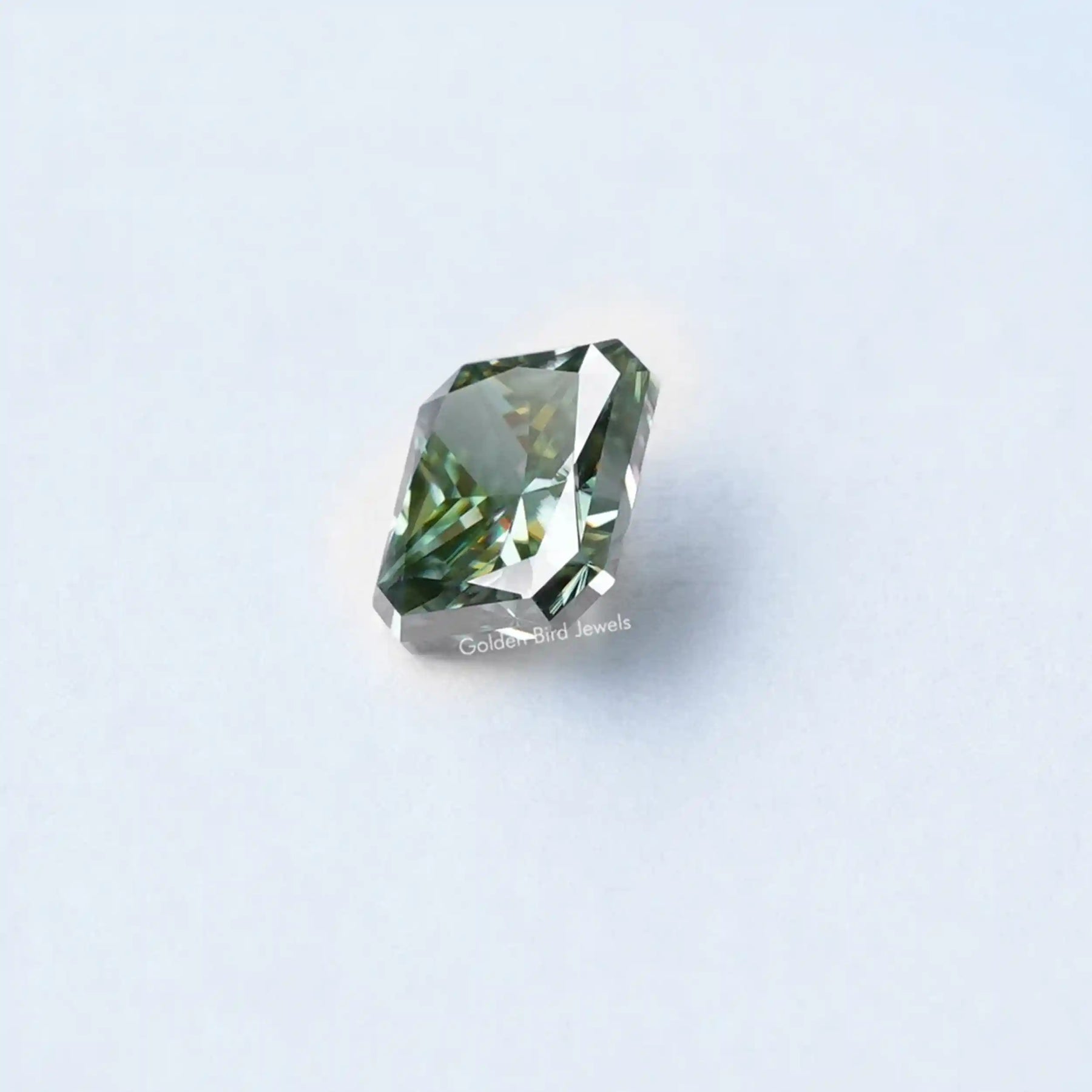 [Top view of blue green radiant cut loose moissanite]-[Golden Bird Jewels]