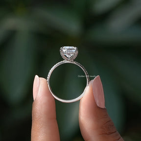 Back View of Cushion Cut Moissanite Hidden Halo Ring In two fingers