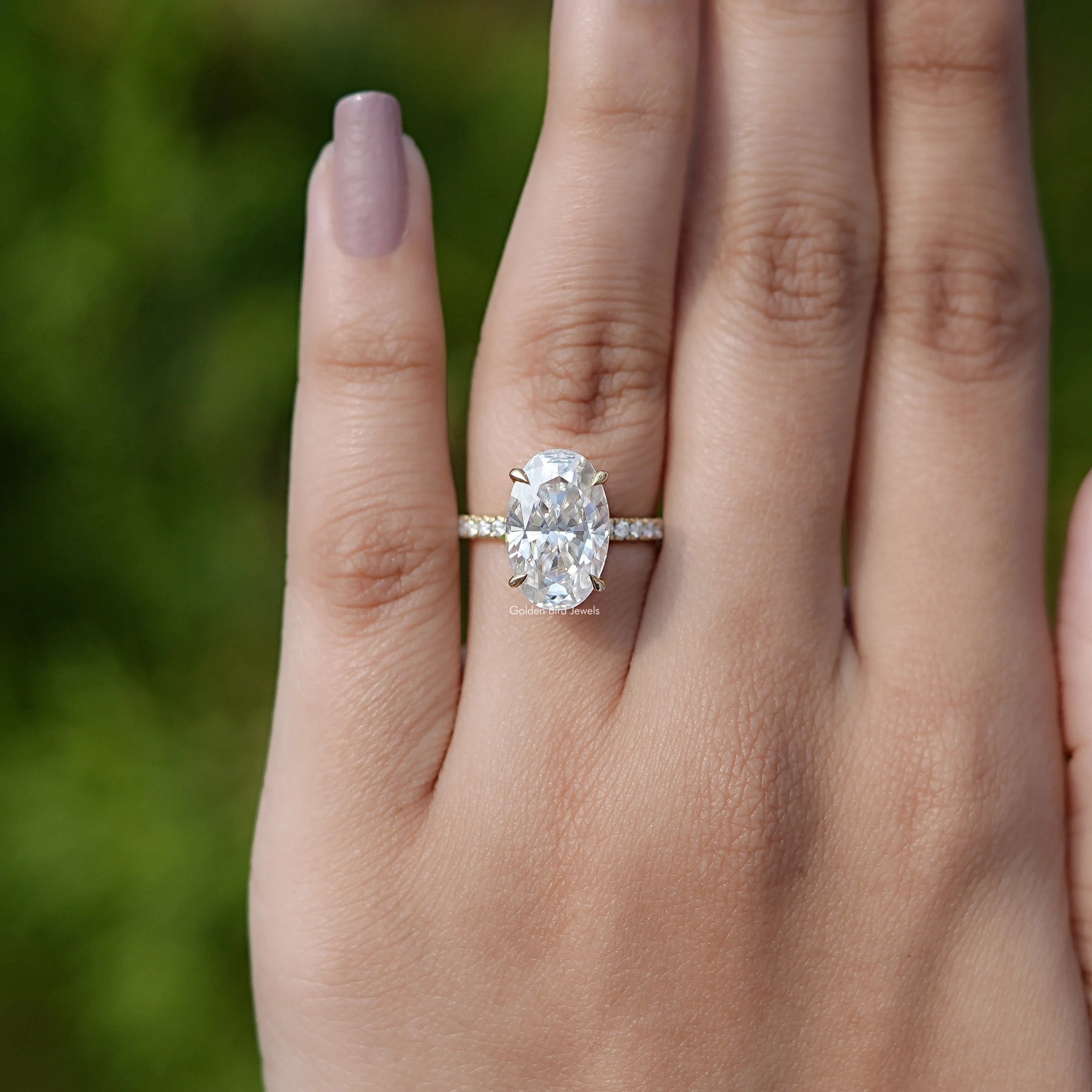 View of Oval Cut Moissanite Solitaire Accent Ring In Finger