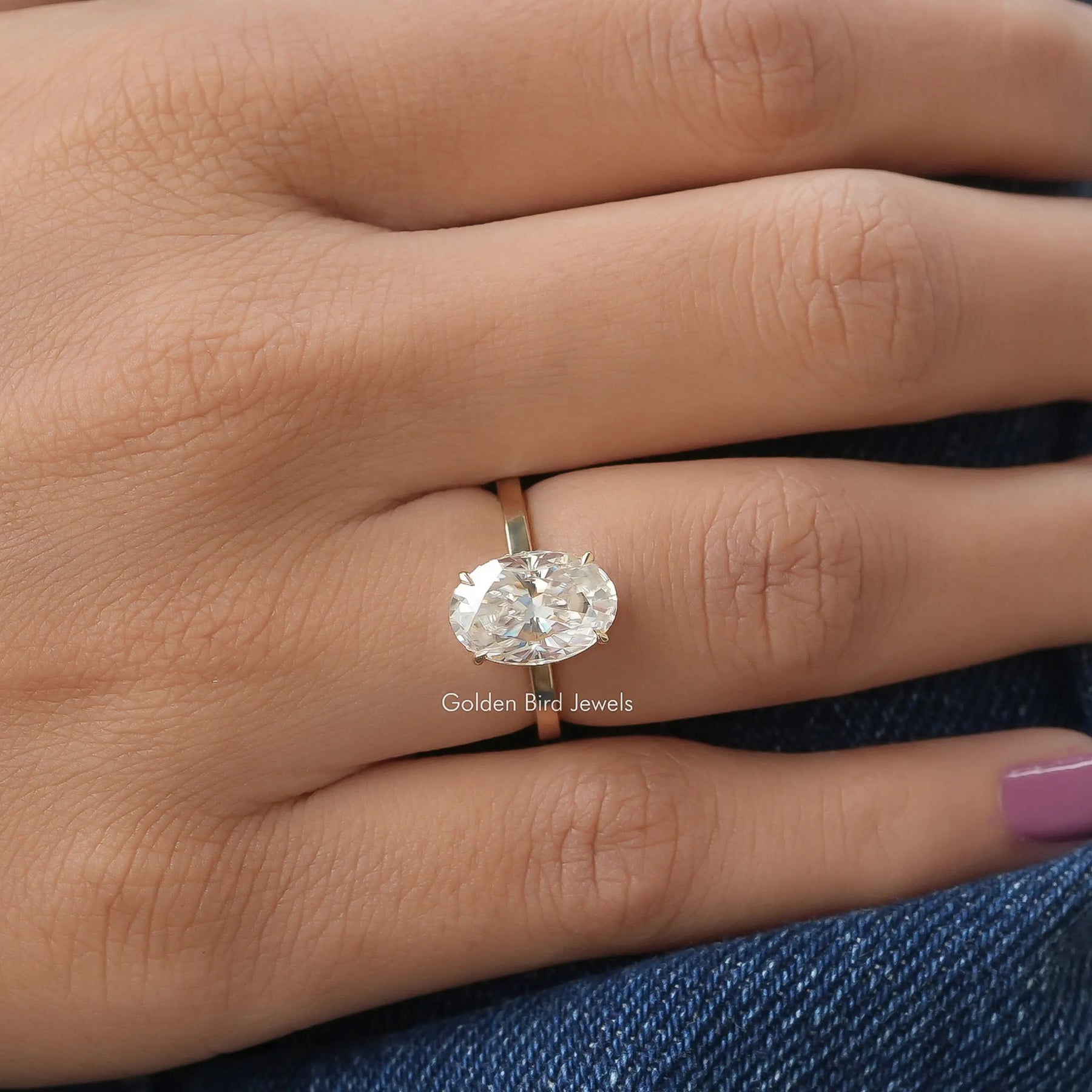 Oval Cut Solitaire Hidden Halo Ring