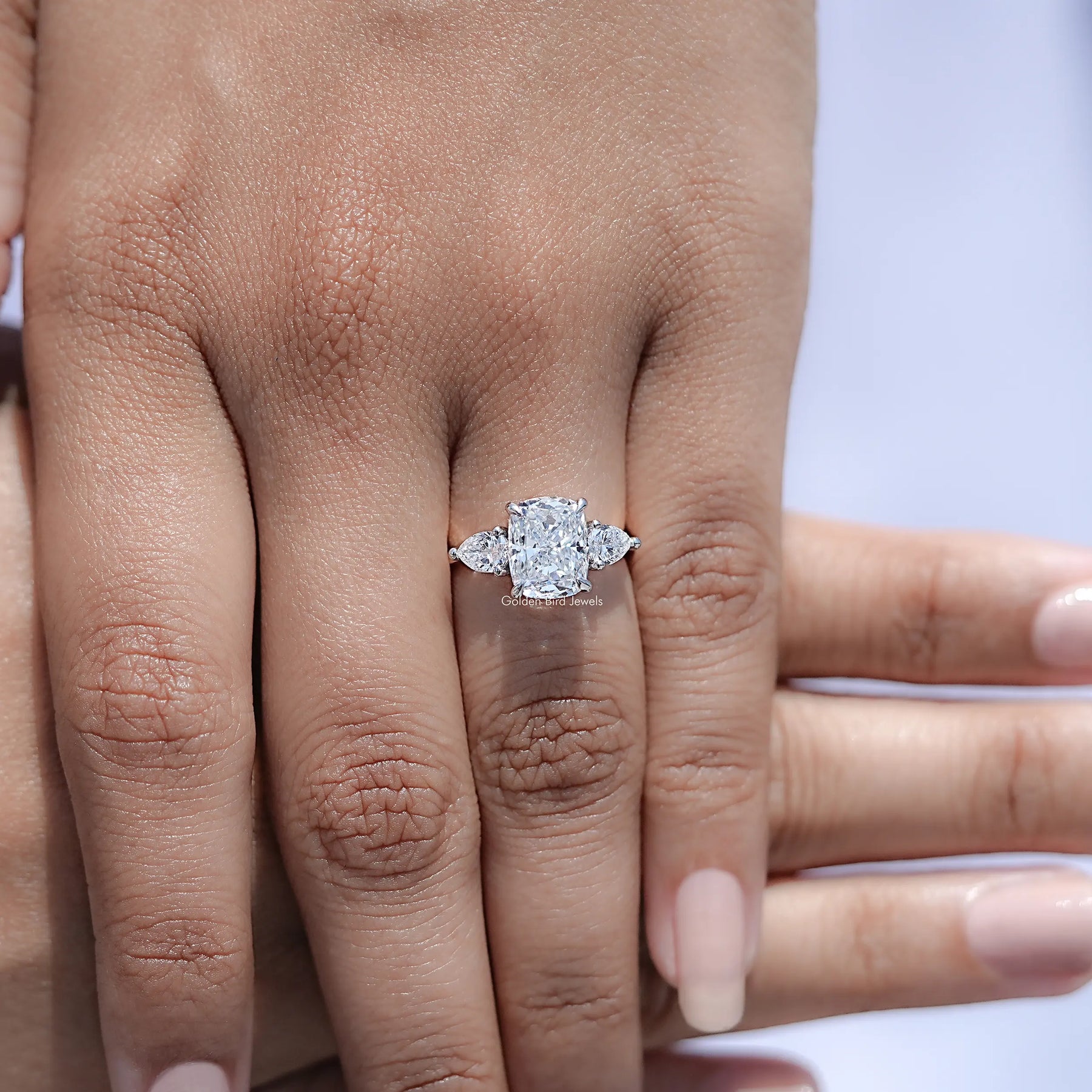 Top view of Cushion Lab Diamond Three Stone Hidden Halo Ring