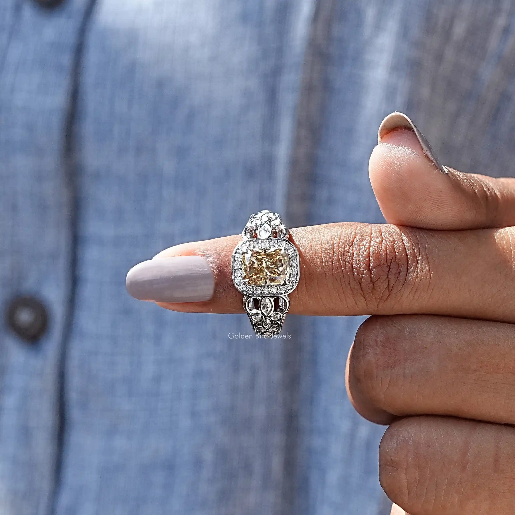 In finger front View of Marquise And Round Cut Halo Ring In White Gold