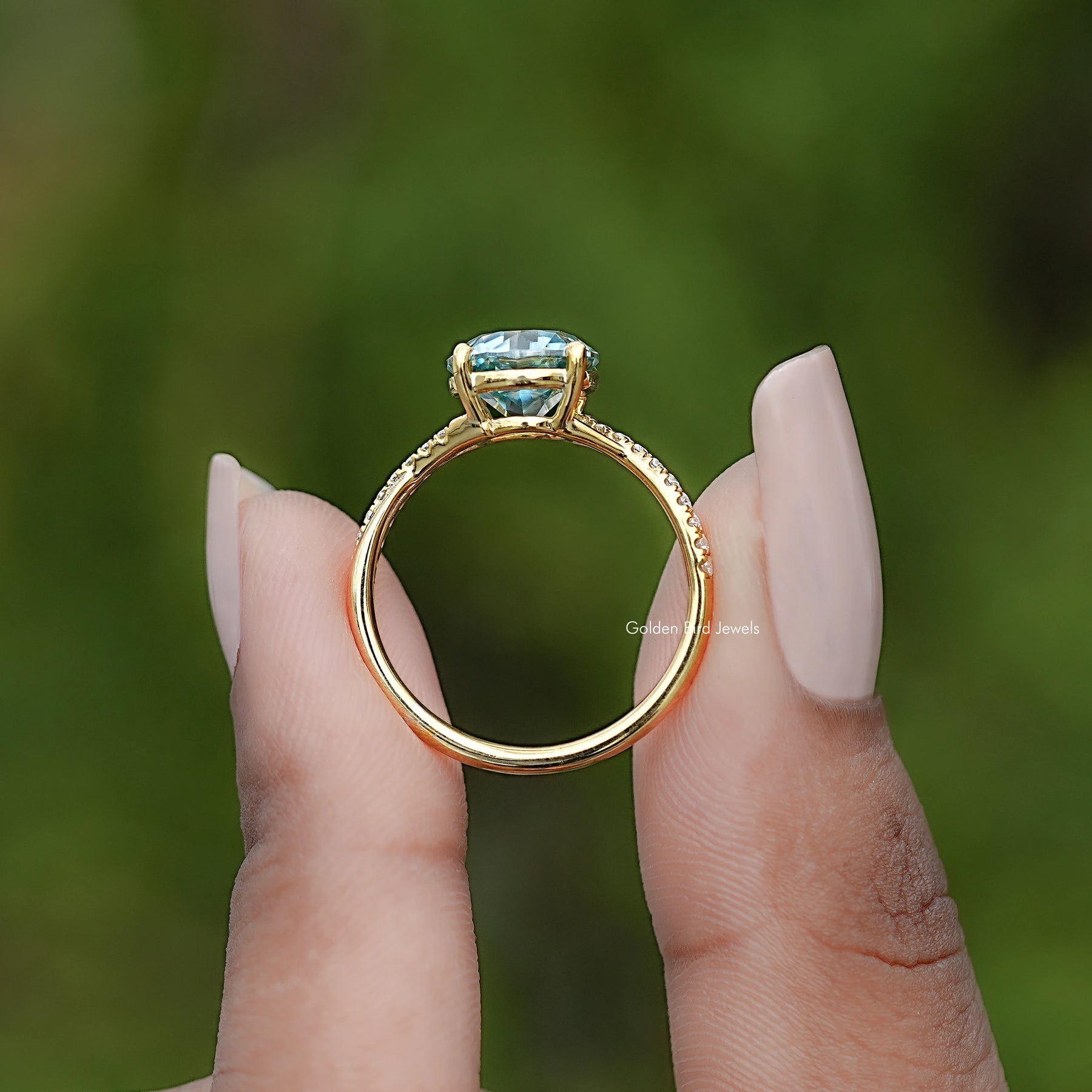 Back view of Round Cut Moissanite Engagement Ring in secure setting 