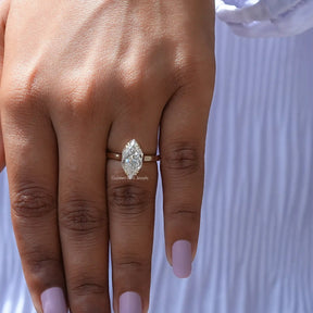 View of Marquise Cut Moissanite Hidden Halo Ring In Yellow Gold