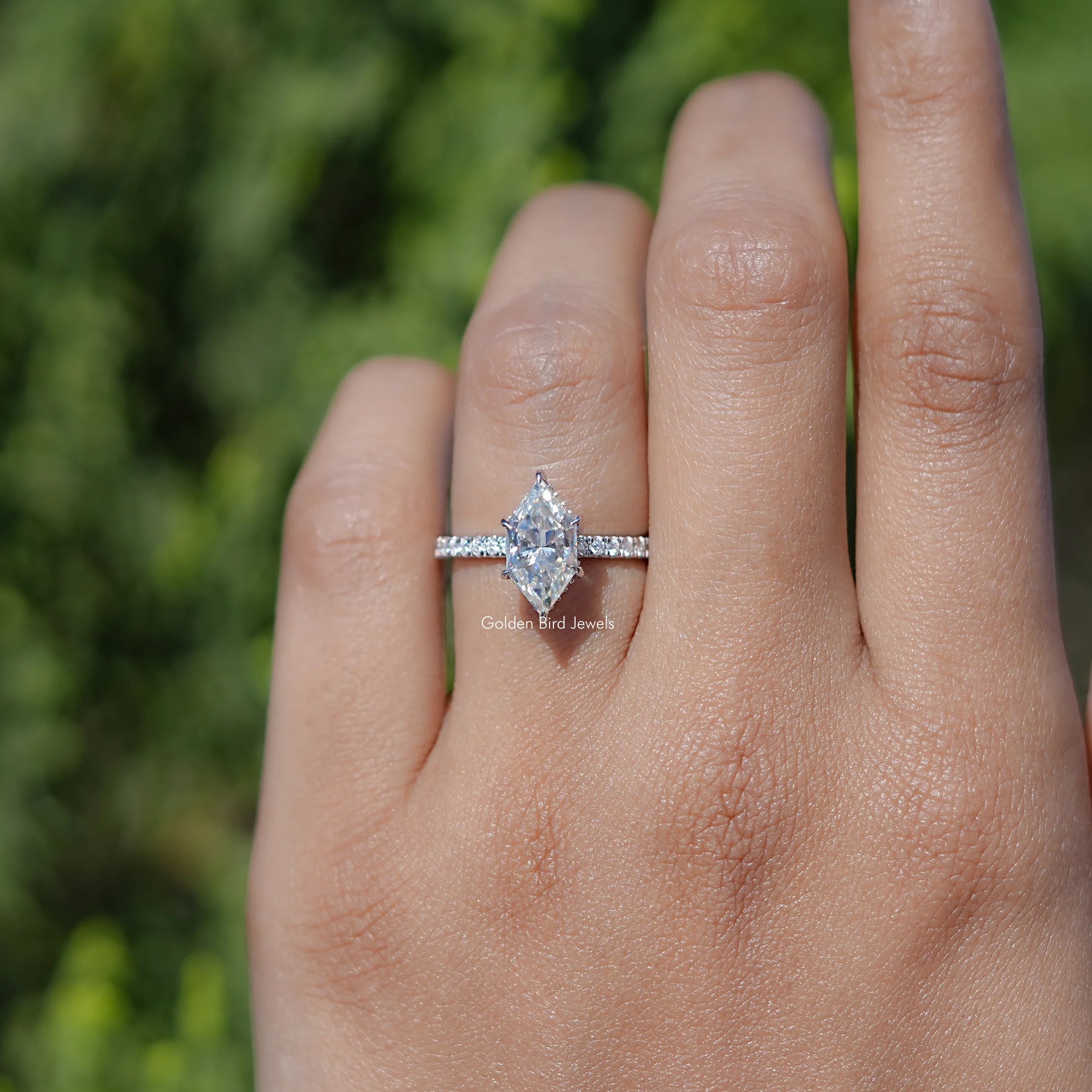 In finger view of Dutch Marquise Shaped Solitaire Moissanite Ring