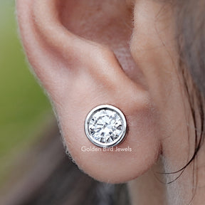 Close up view of Round Cut Lab Diamond Bezel Stud Earrings