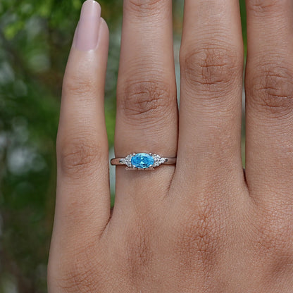 Oval Cut East West Gemstone Ring In finger