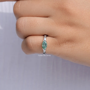 Close View Of East West Moval Moissanite Solitaire Ring 
