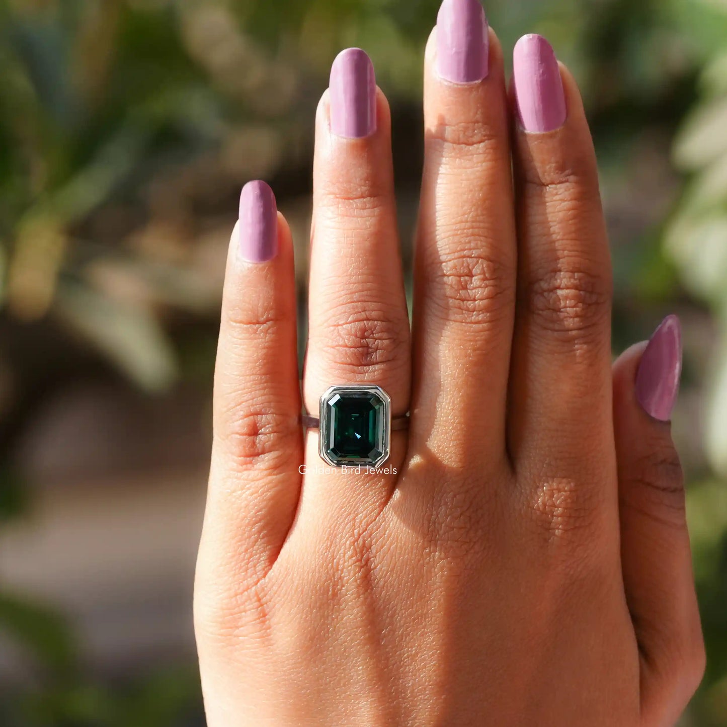 View of Emerald Cut Moissanite Solitaire Ring In finger