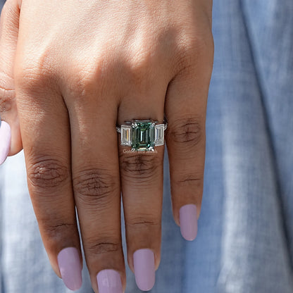 Front View of Emerald Cut Moissanite Three Stone In White Gold