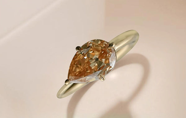 Old Mine Pear Shaped Moissanite East West Ring