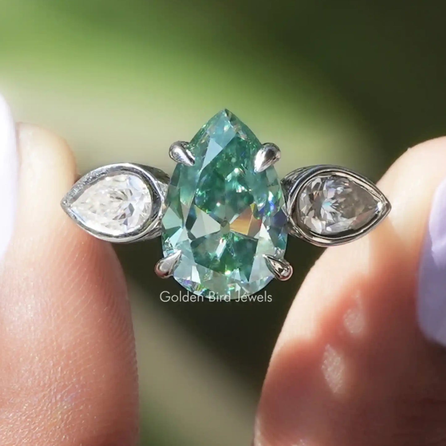 Old Mine Pear Cut Moissanite Three Stone Ring
