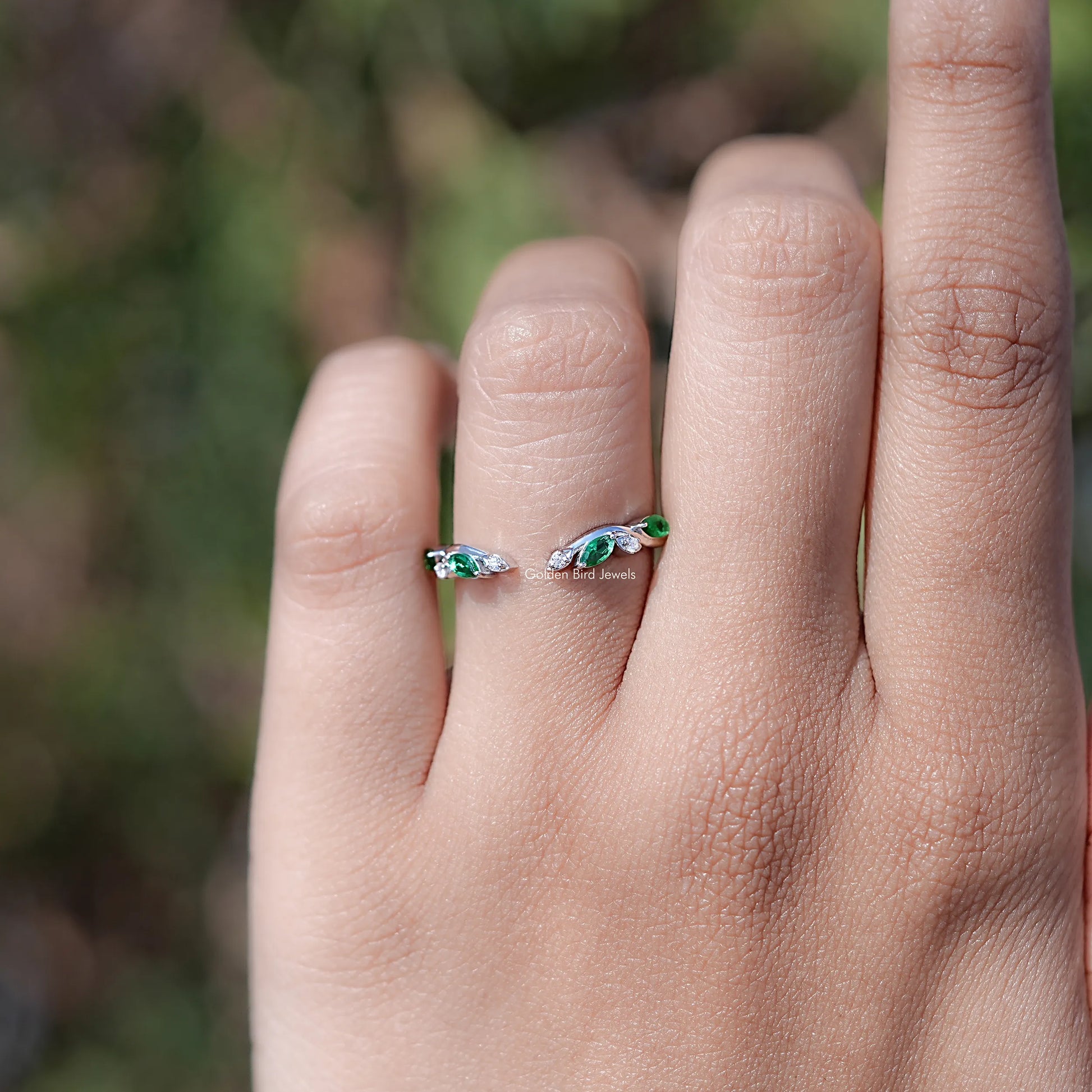 In finger view of Marquise Cut Moissanite Solitaire Ring