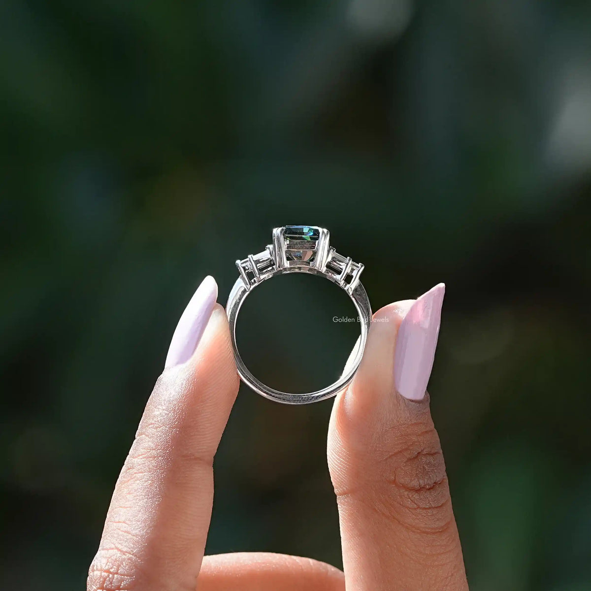 Back View of Radiant Cut Moissanite Ring In two fingers