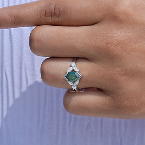 Close-Up View of Emerald Green Hexagon Cut Gemstone Ring In White Gold