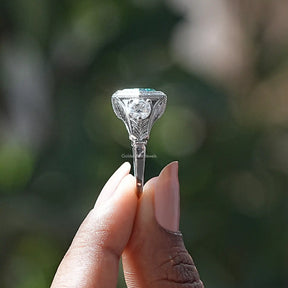 Side View of Hexagon Cut Moissanite Ring In two fingers