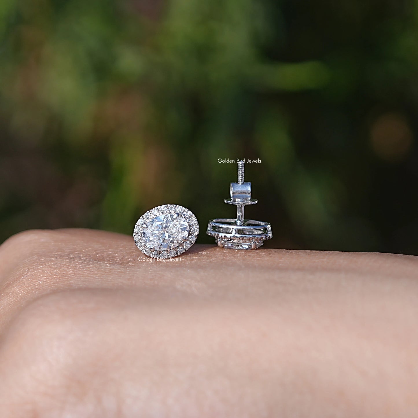 Front and Back View of Oval Cut Halo Diamond Studs Earrings In White Gold 