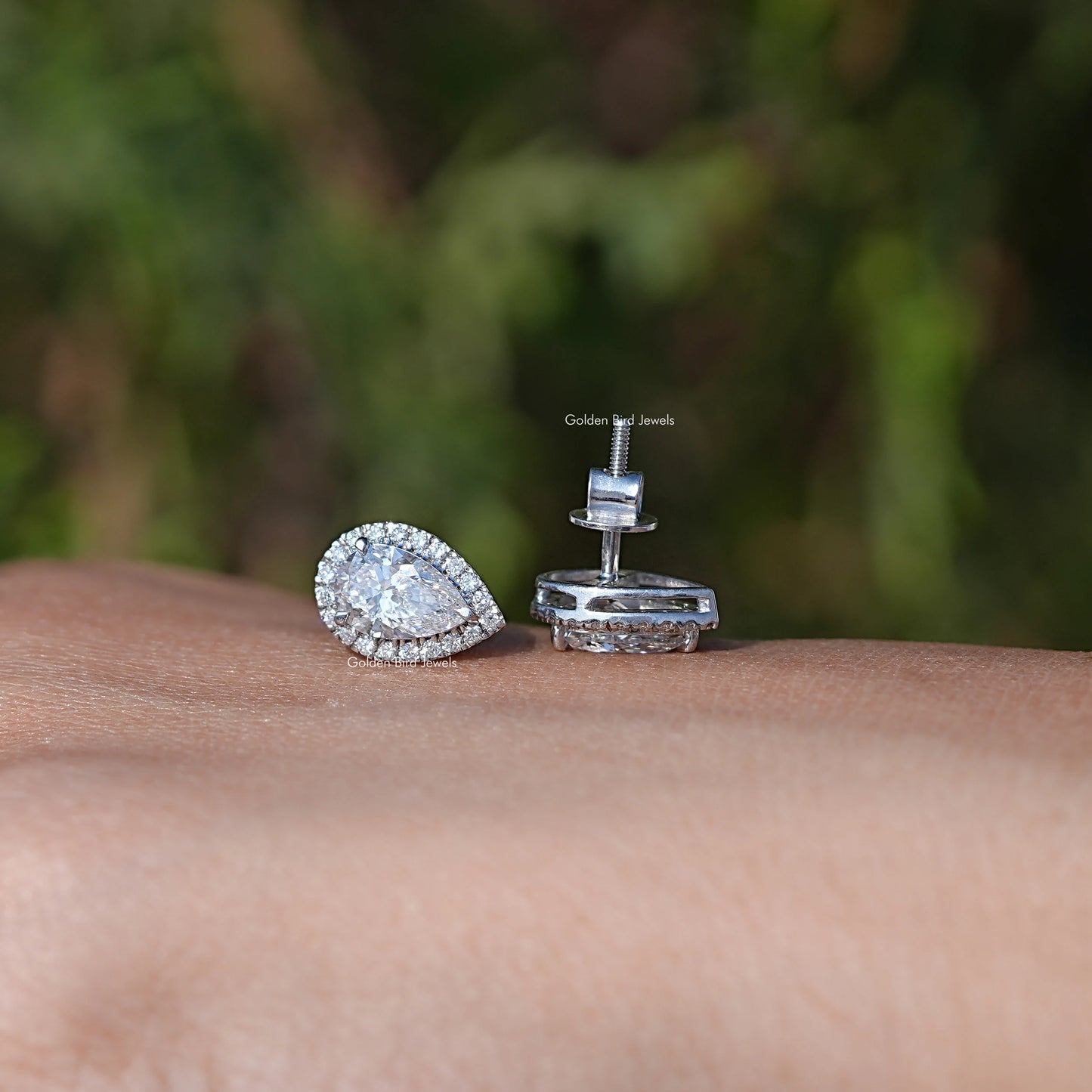 Front And Back Side View Of Solitaire Stud Earrings In Women's
