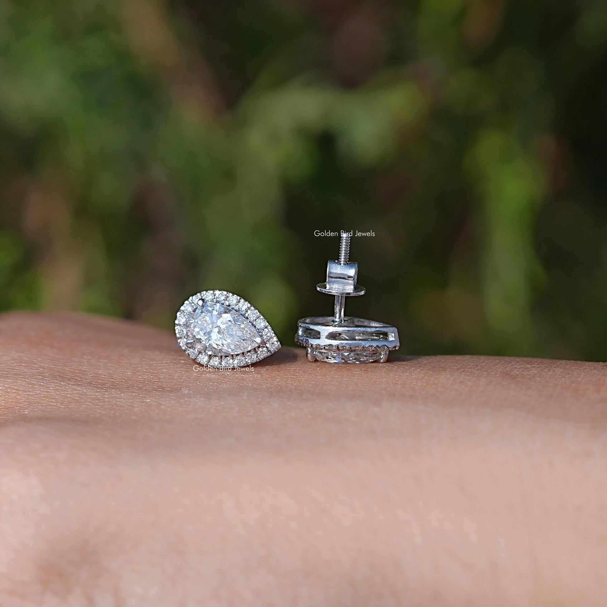 Front And Back Side View Of Solitaire Stud Earrings In Women's