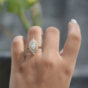 View of Marquise Cut Halo Engagement Ring In Finger 