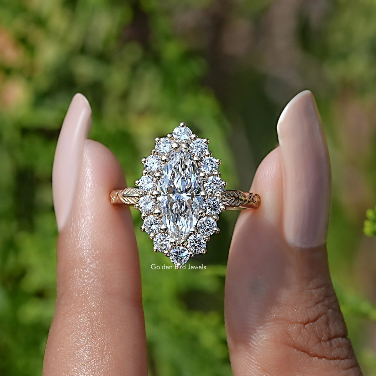 Front View of Marquise Cut Lab Diamond Halo Engagement Ring In two Fingers