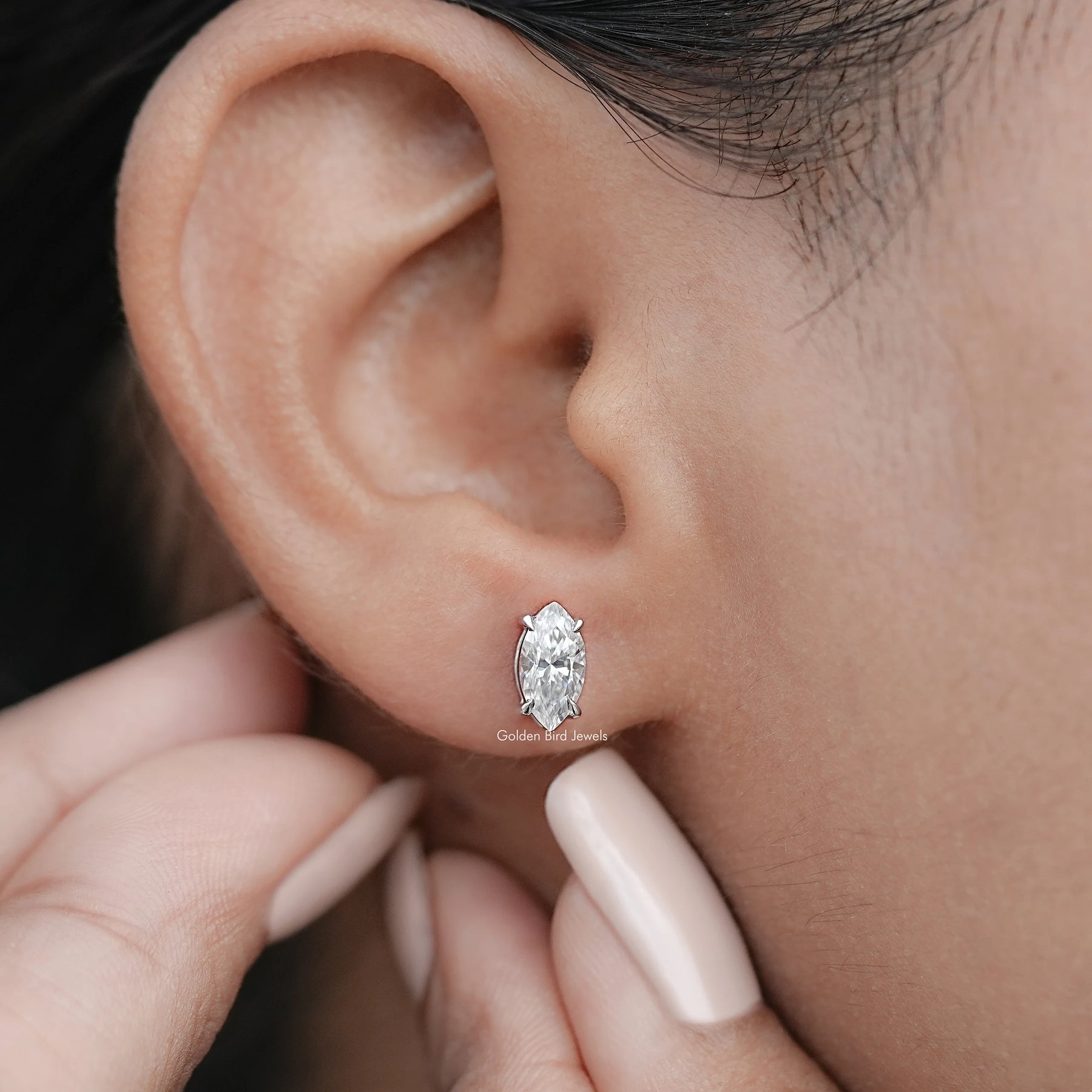 Detailed view of Marquise Shaped Moissanite Stud Earrings in secure setting