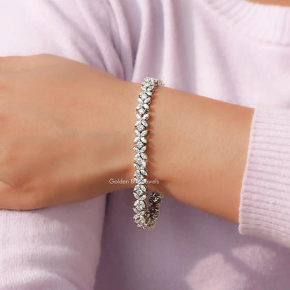 View of Round Cut Lab Diamond Marquise Bracelet In Women's Hand 