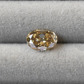 [Front view of oval cut loose moissanite crafted with brown color]-[Golden Bird Jewels]