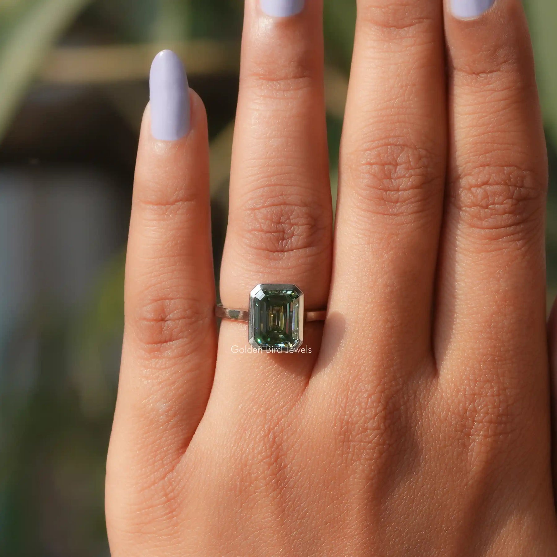 Emerald Cut Bezel Set Moissanite Solitaire Ring